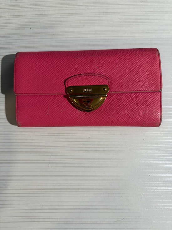 MCM Handbags - MCM pink wallet has rubbing on corners